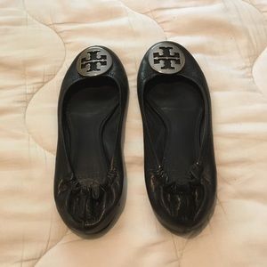 Tory Burch black with silver emblem flats size 8